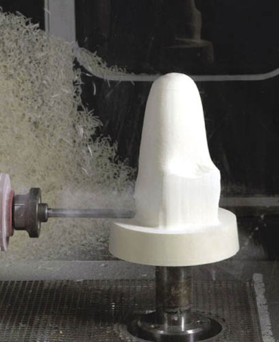 Three-axis milling of hard foam for creation of a positive model of the patient’s limb, to be used in the thermoforming process.